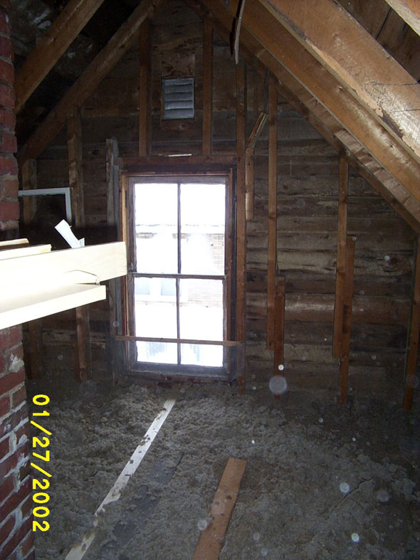 The north side of the attic has a window, but the wood is in bad shape and it will open only a few inches.  It will probably be easier to replace rather than to try to repair it.
