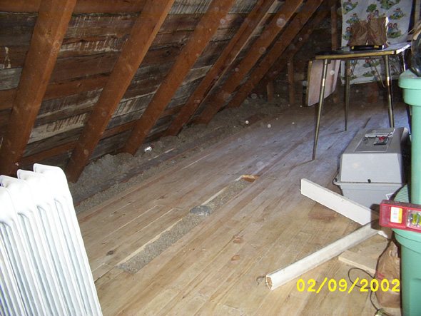 The entire west side of the attic floor is pretty much done.  I'm going to finish it off with an 11-inch board on the side.  I'll be building shelves or storage spaces into the eaves, so it won't matter that it looks different than the rest of the floor.