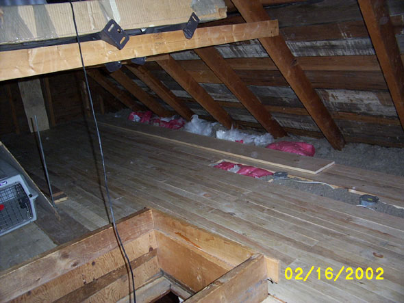 I've been putting off the nasty job of pulling the old insulation material out and away from the eaves.