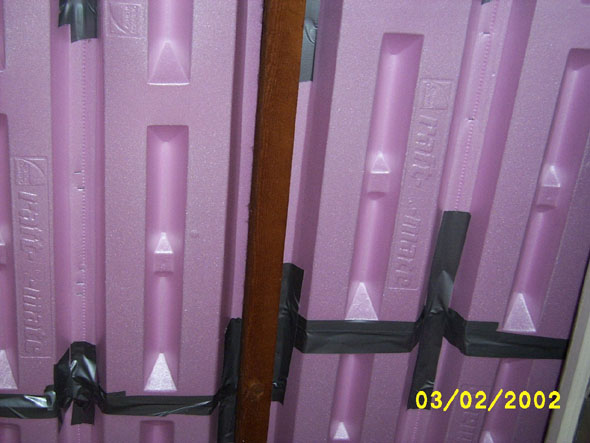 Just some pretty pink prop vents.  Pulling the insulation from within the eaves is going to be a long and uncomfortable task, but I should have fewer ice dams next year.