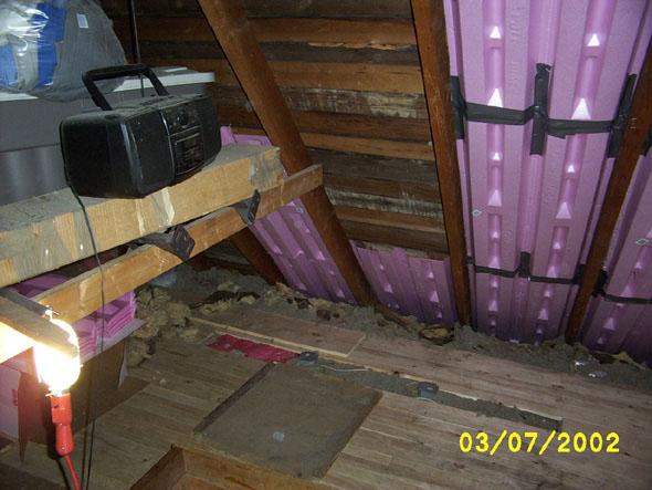 This is as far as I've gotten on the west side so far -- all the way north to the end, and this far to the south.  I can't go any further until I remove the old crossbeams on the south side.