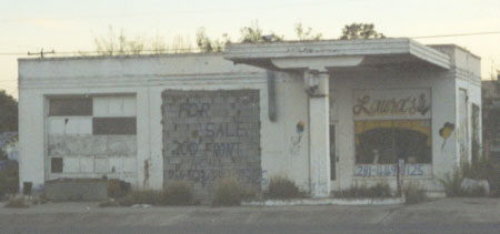 This gas station used to be owned by Wesley Dixon during World War II.  He had a cage next to the station where he kept a bobcat that he had raised from a kitten.  Probably killed by oppressive EPA regulations, this W Santa Rosa building has more recently served as a flower shop.