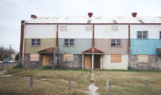 The Cotton Gin Apartments were condemned last year, and may or may not reopen.  Condemned last year, the Cotton Gin Apartments now provide a playground for the city�s street gangs.