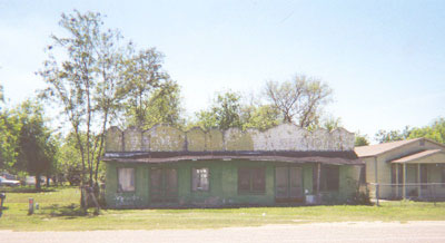 Located on Lackland Street, across from Longoria�s, this building appears yet to house a beauty parlor.