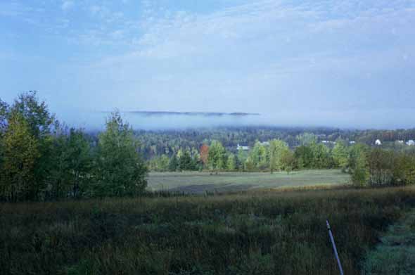 Another view of Soldier Pond from Sly Brook Road, with the morning fog hanging overhead.